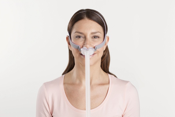 resmed airfit p10 nasal pillow mask on model from front